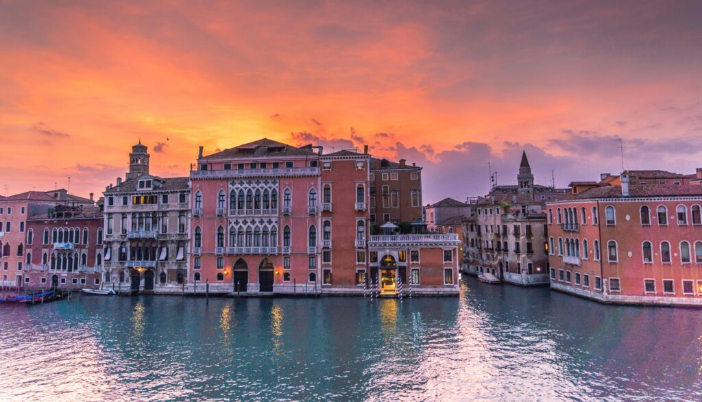 venice italy sunset grand canal 158441 158441 Captivating view of Venice's Grand Canal during sunset showcasing historic architecture and serene waters.